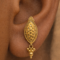 Handmade 22K gold leaf stud earrings close-up Pure 22K solid gold leaf earrings for women Minimal leaf drop design 22K gold stud earrings