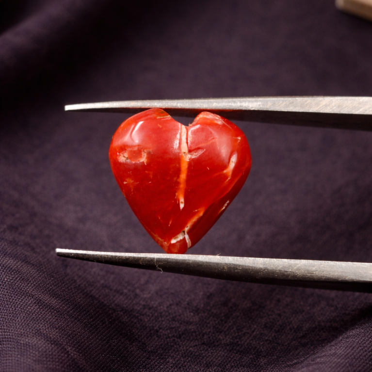 Natural Italian red coral hand polished heart shape stone